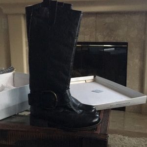 Peggie black leather boots.